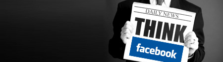 Image of business man holding a Facebook sign