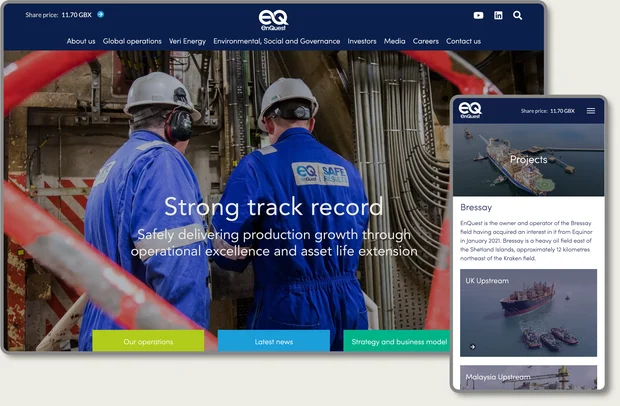 Two workers in safety helmets and blue overalls examine equipment on an industrial site, with text highlighting operational excellence and growth.