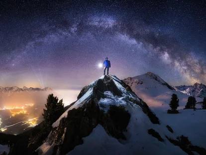 Man on top of a mountain