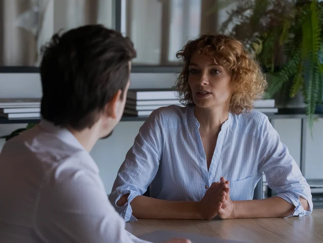Two people in a workplace setting