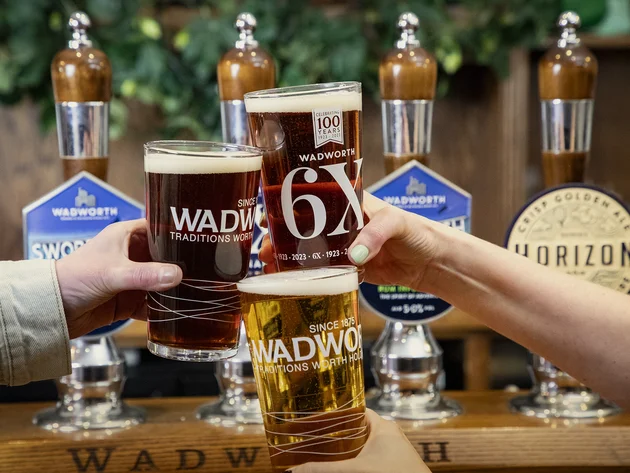 Cheers glasses in a Wadworth pub