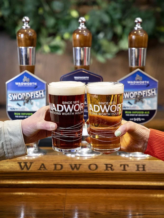 Pint glasses and cheers