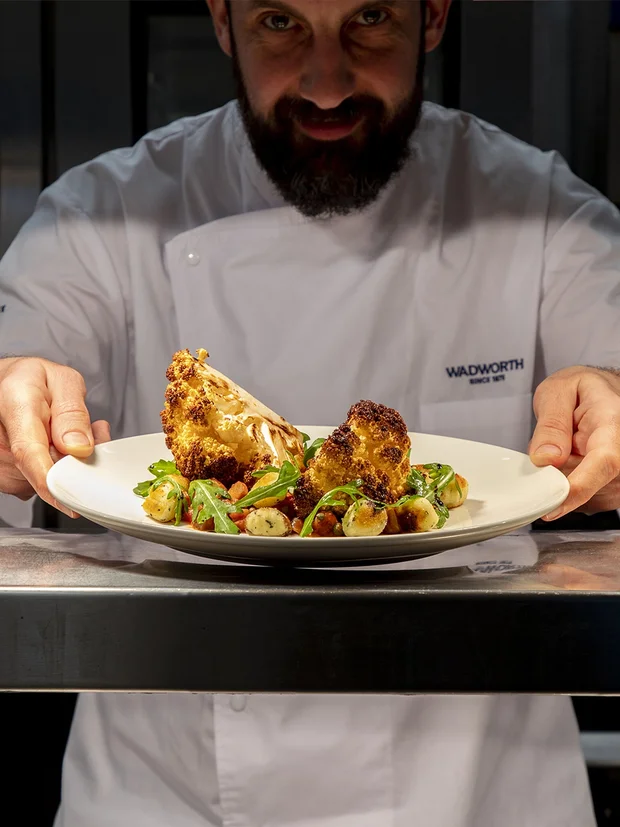A Wadworth chef serving food