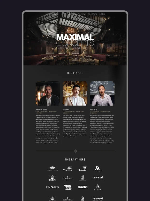 A stylish restaurant interior featuring a high ceiling, framed by the text "MAXIMAL CONCEPTS" and portraits of three individuals.